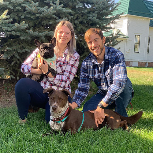 Dutton the french bulldog with his adoptive family