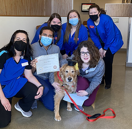 LVMC care team with Maggie the dog.